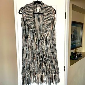 Knee length sweater vest from Chico’s.  Colors are grays, pinks and mauves.